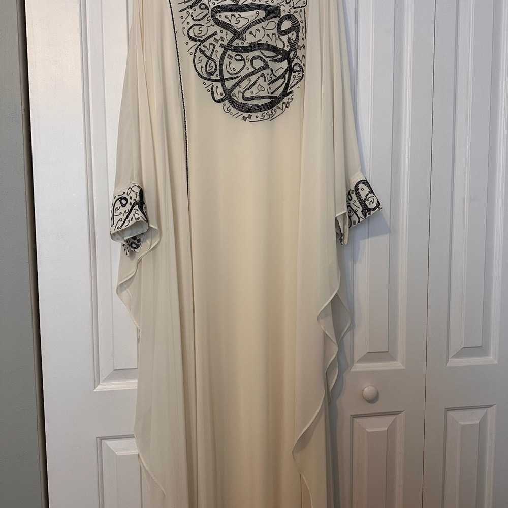 Elegant Cream kaftan with arabic calligraphy